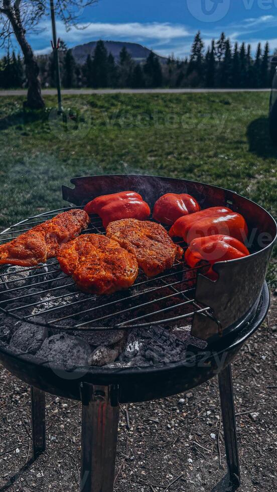 Beef steaks on the grill with flames photo