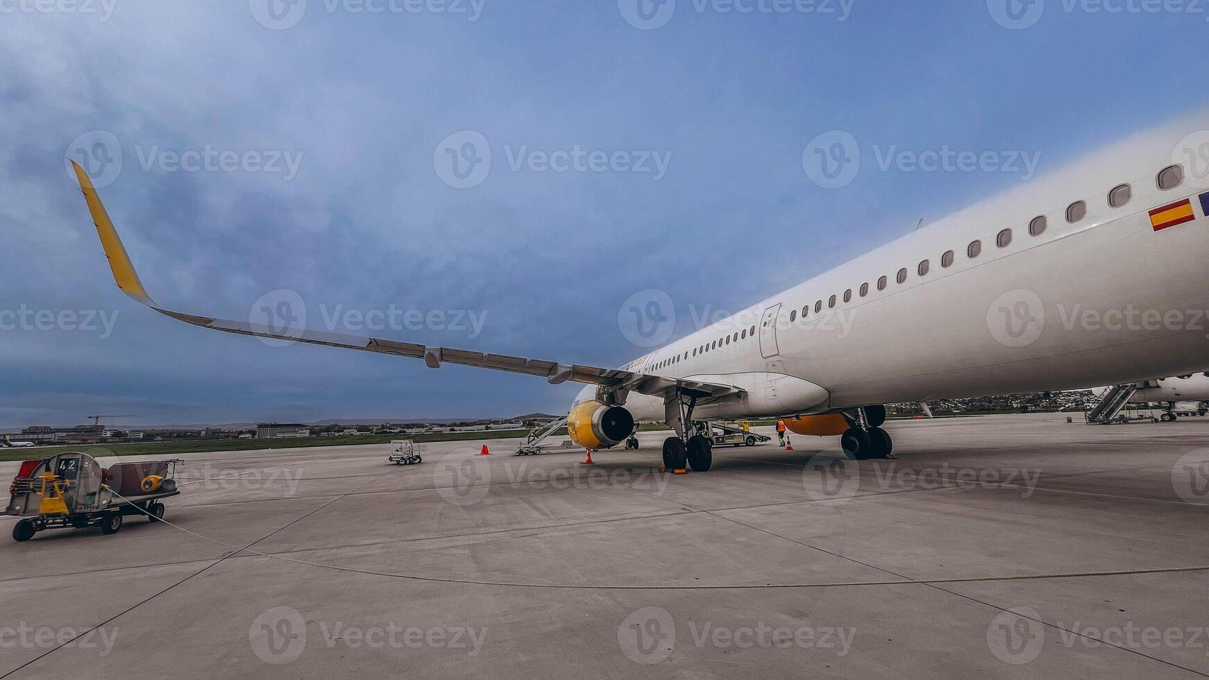 Airplane on the platform of Airport. Runway. Landing aircraft closeup. photo