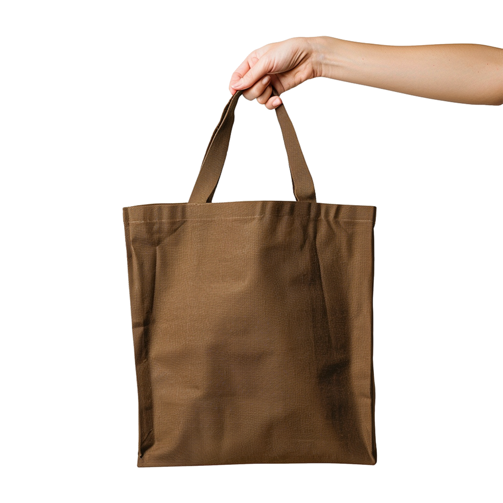 hand holding brown eco friendly tote bag isolated on transparent background png