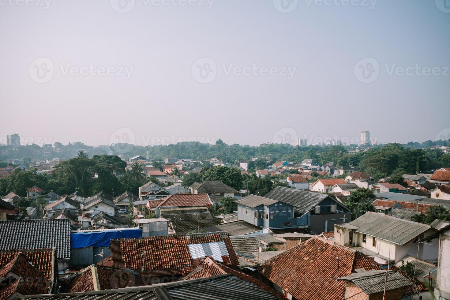 A restaurant rooftop venue showcasing a stunning cityscape view below photo