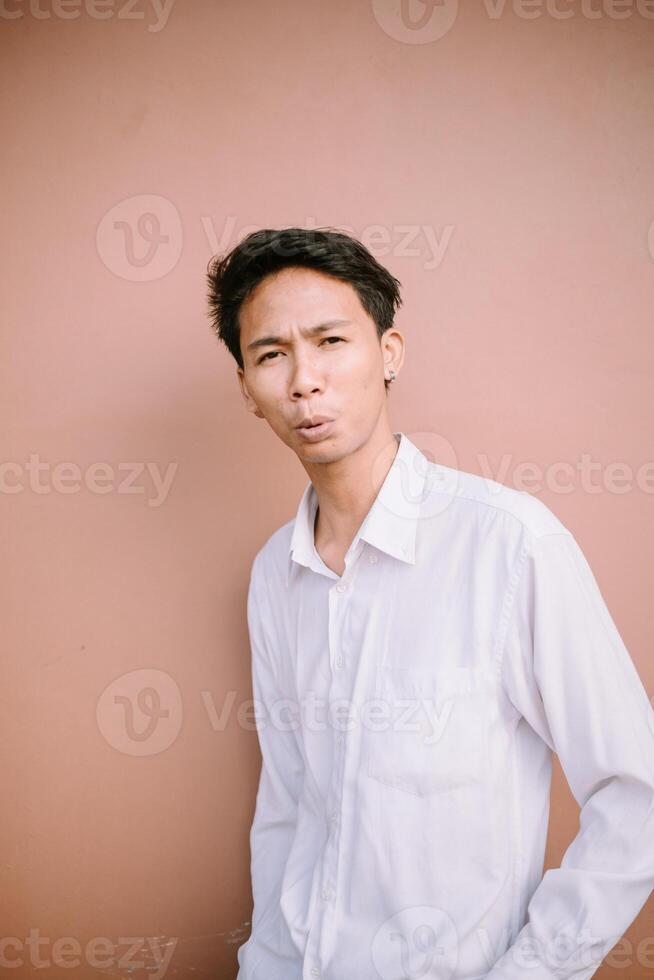 A man whistling, captured in a moment of joy or concentration, expressing himself through a melodic sound photo