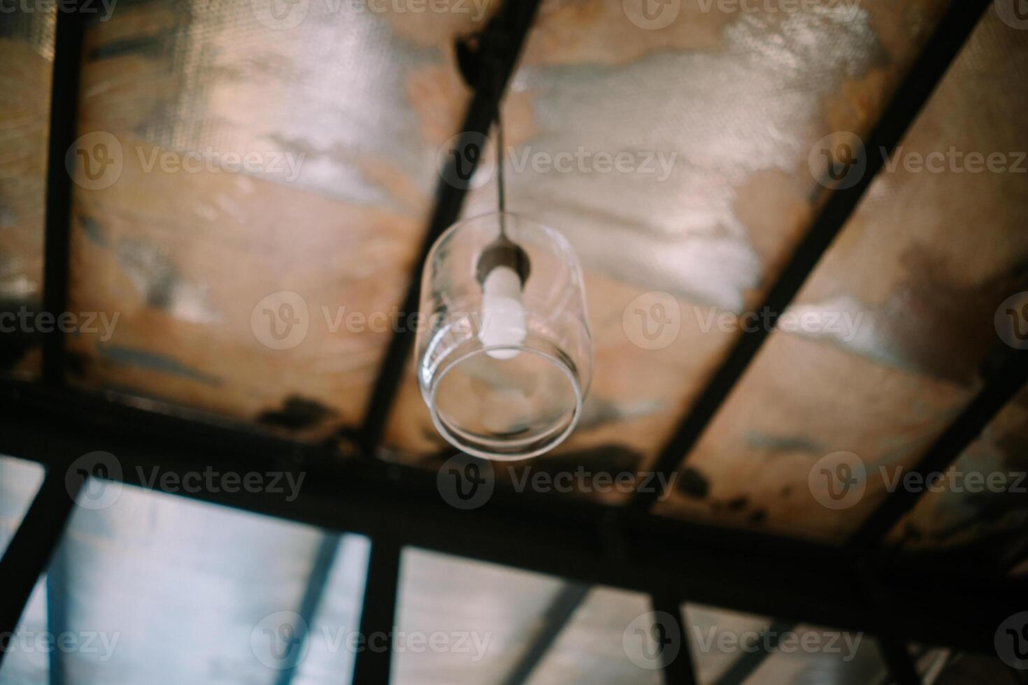 Charming light with a sleek clear glass cover, ideal for modern decor.Stylish light fixture with a clear glass cover, perfect for a chic decor photo