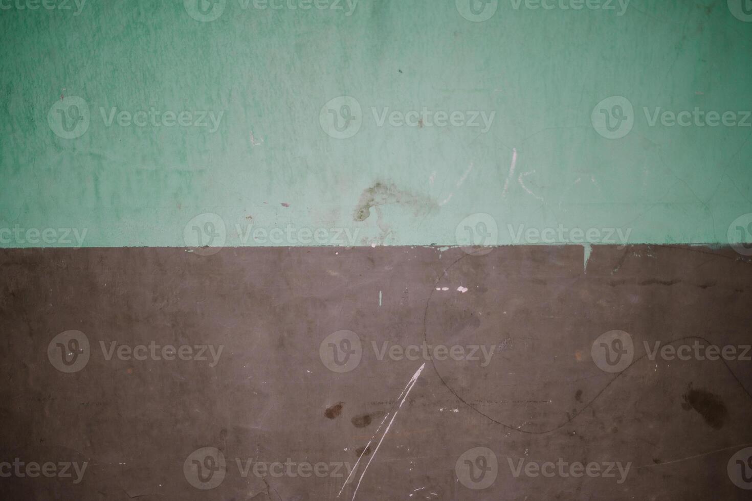 Abstract image of a wall with faded green and brown hues photo