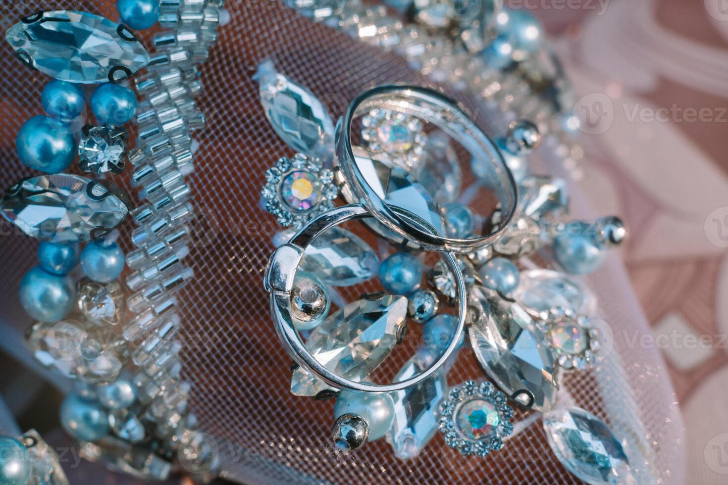 A wedding ring delicately placed on a woman's shoe, symbolizing the journey of love and commitment that begins with a single step photo