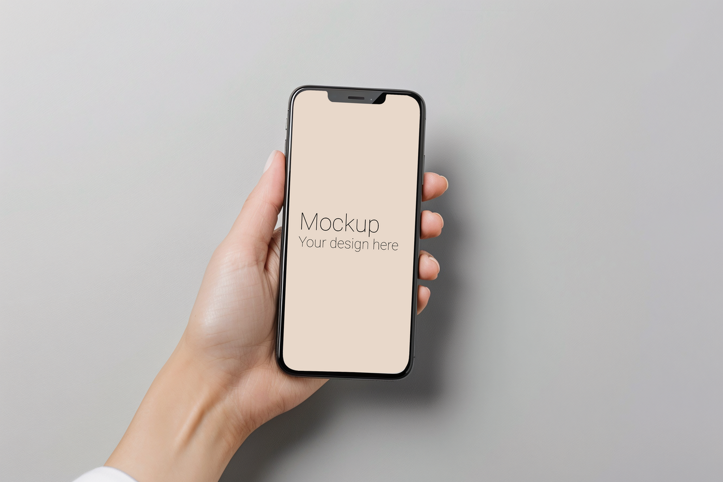 Mockup of black smartphone in hand on gray background psd