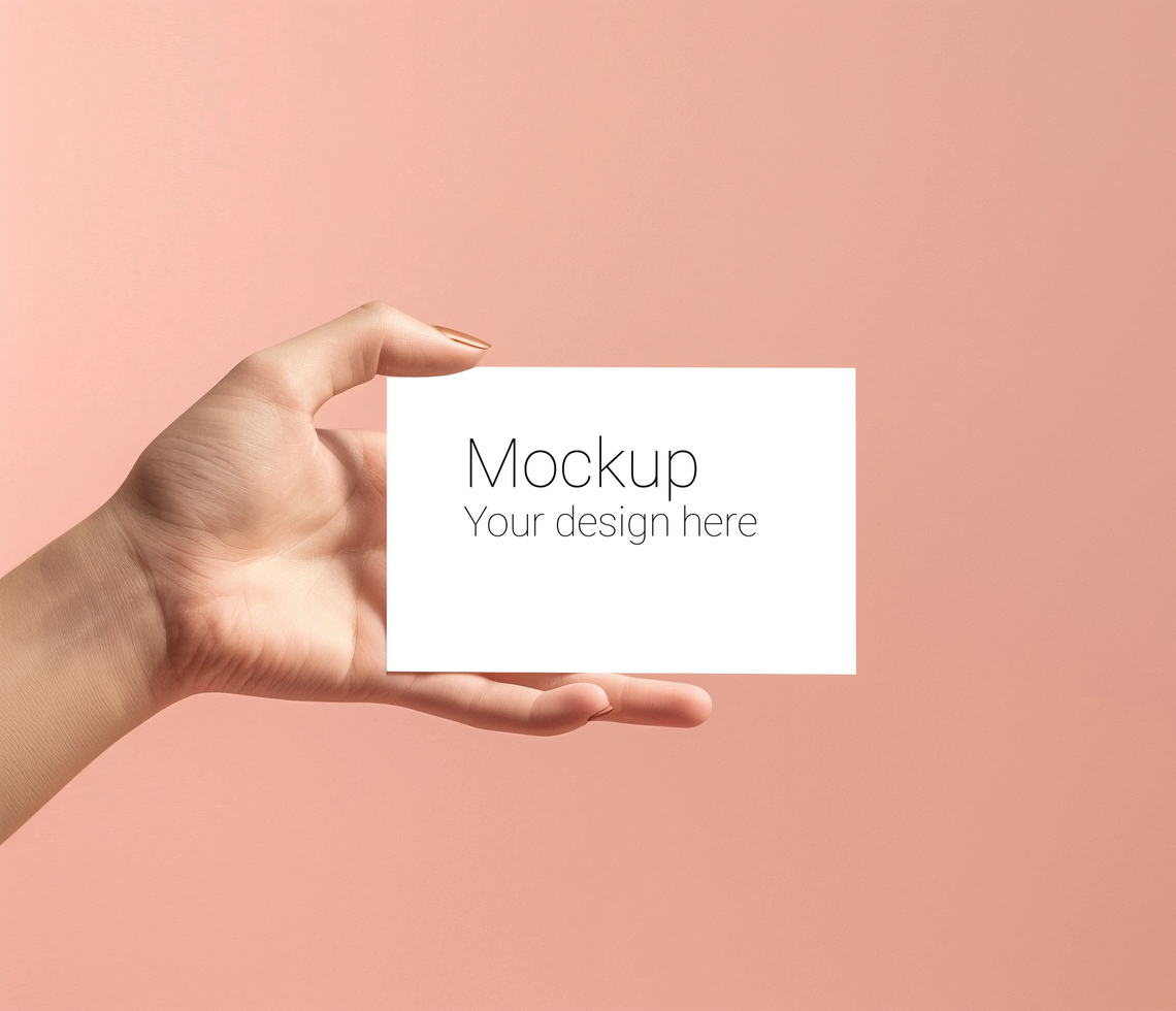 Mockup of greeting card in hand on pink background psd