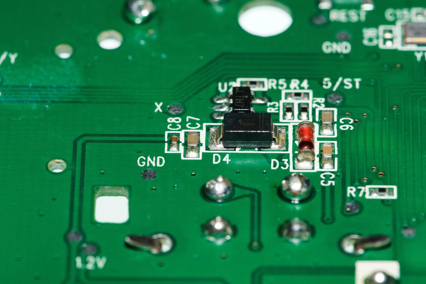 a close up of a circuit board with many different components photo