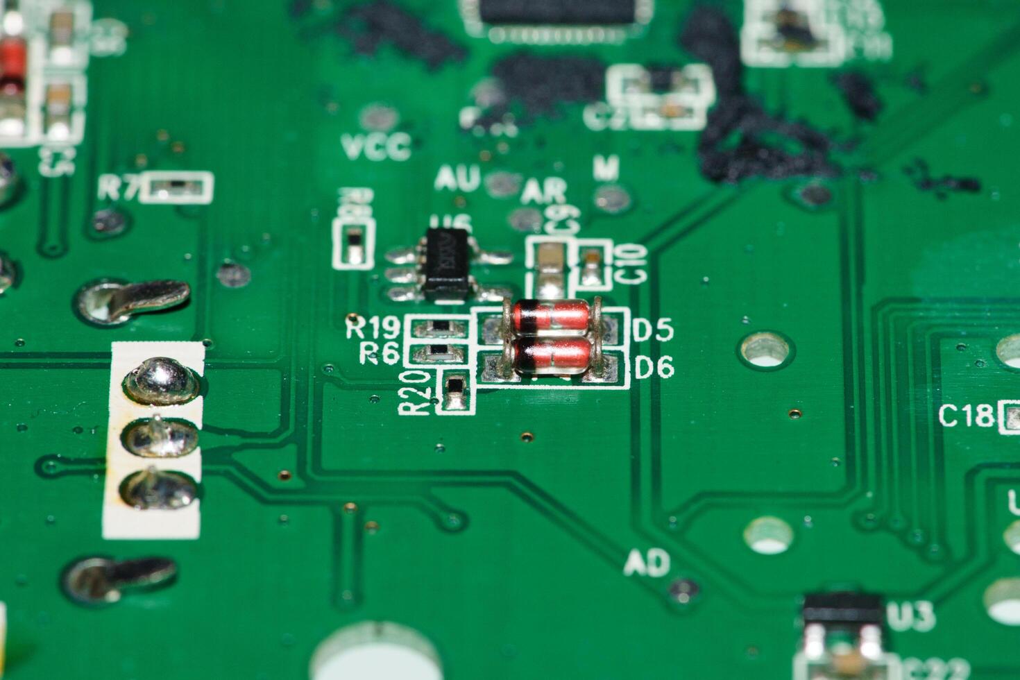 a close up of a circuit board with many different components photo
