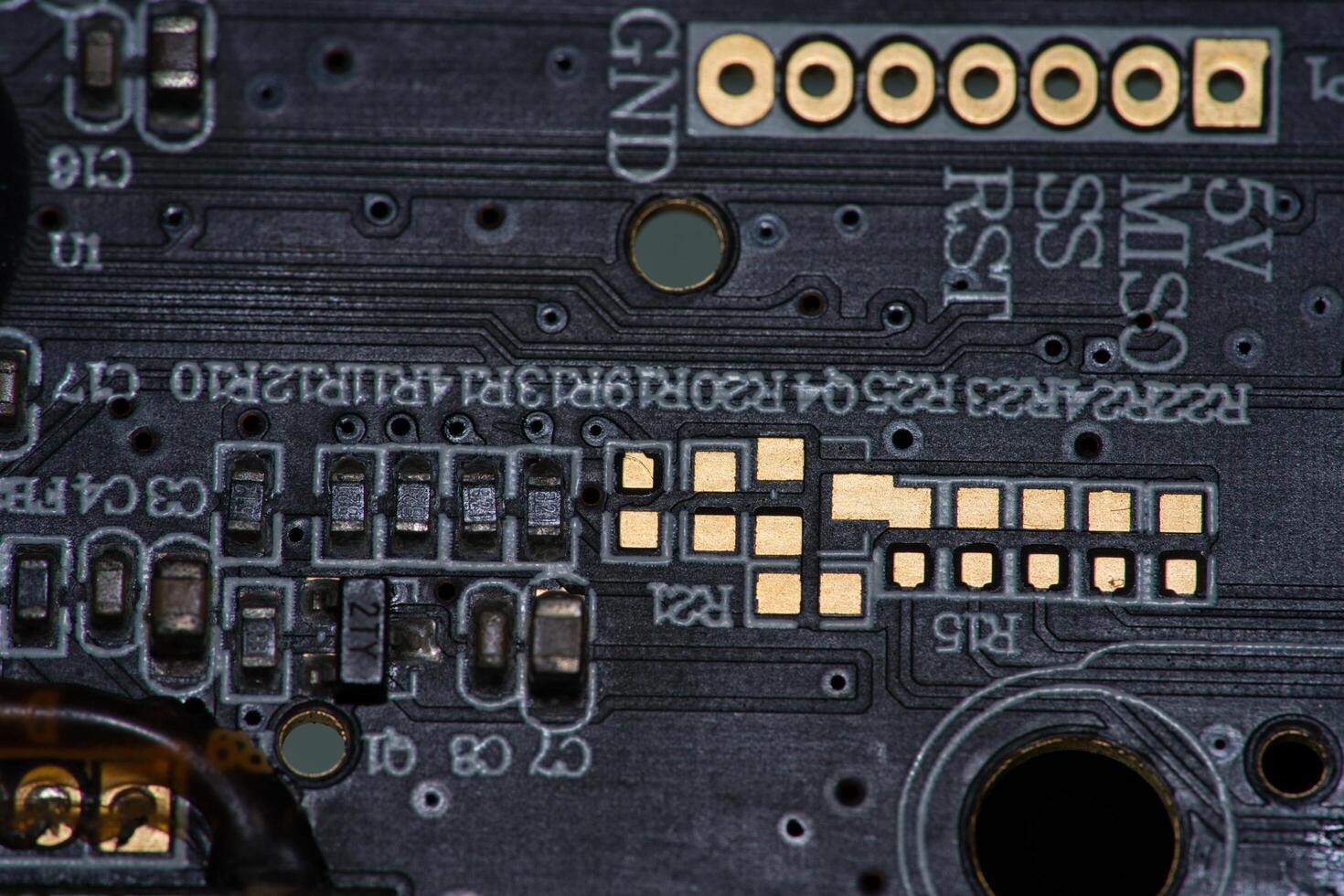 a close up of a circuit boards photo