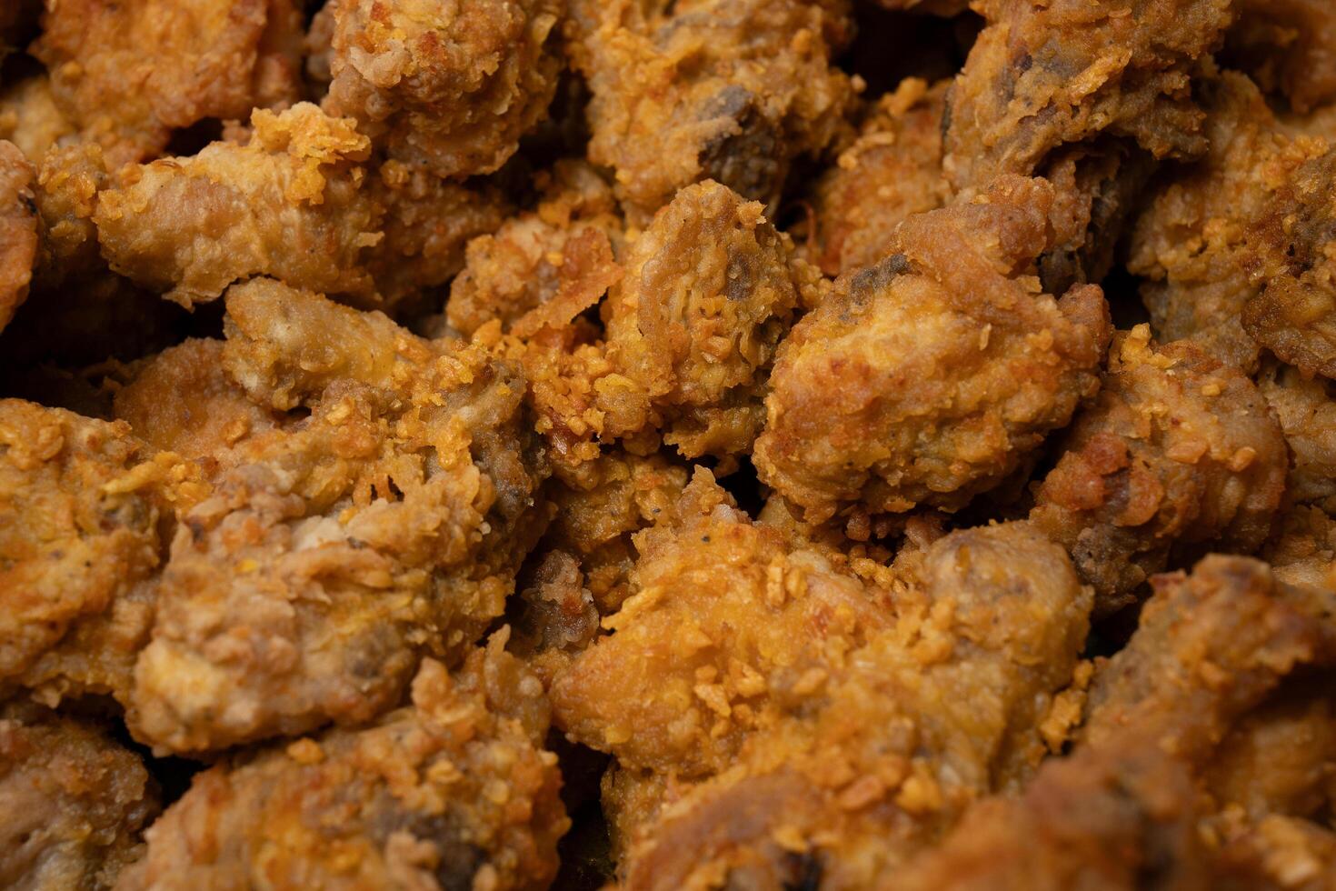 a close up of fried chicken in a bowl photo