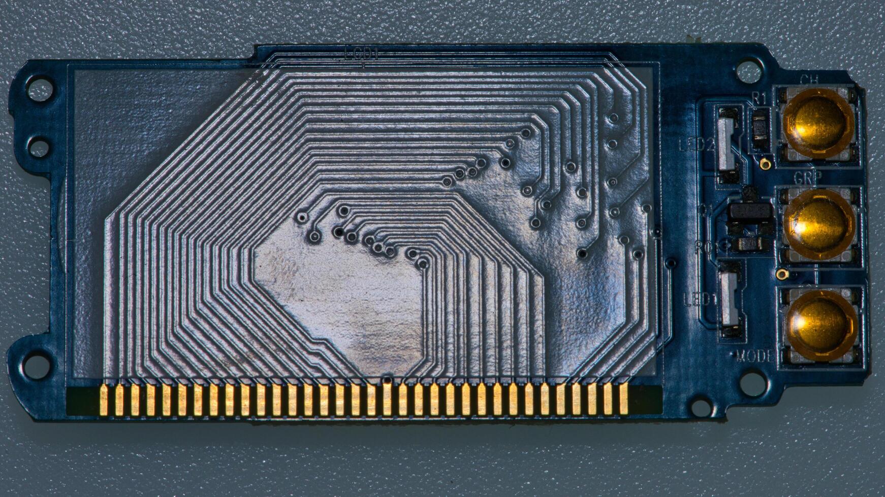 a close up of a motherboard with a small hole photo
