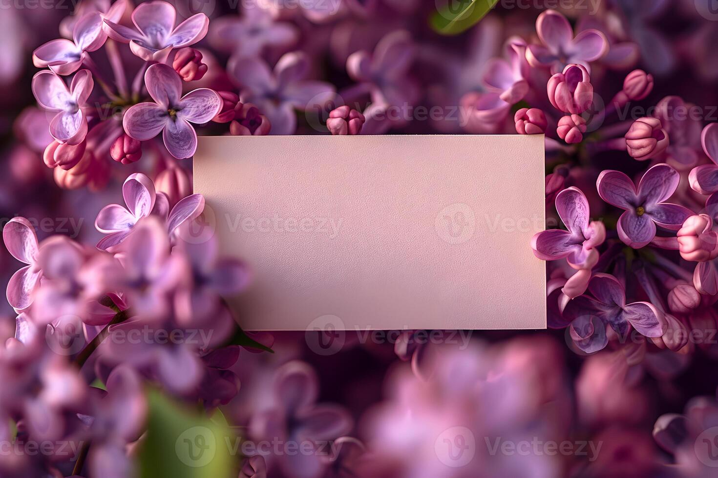 Empty rectangle label mockup with purple lilac flowers. Blank price, gift, sale, designation, medicine, cosmetics, title or gift tag template with flowers background. photo