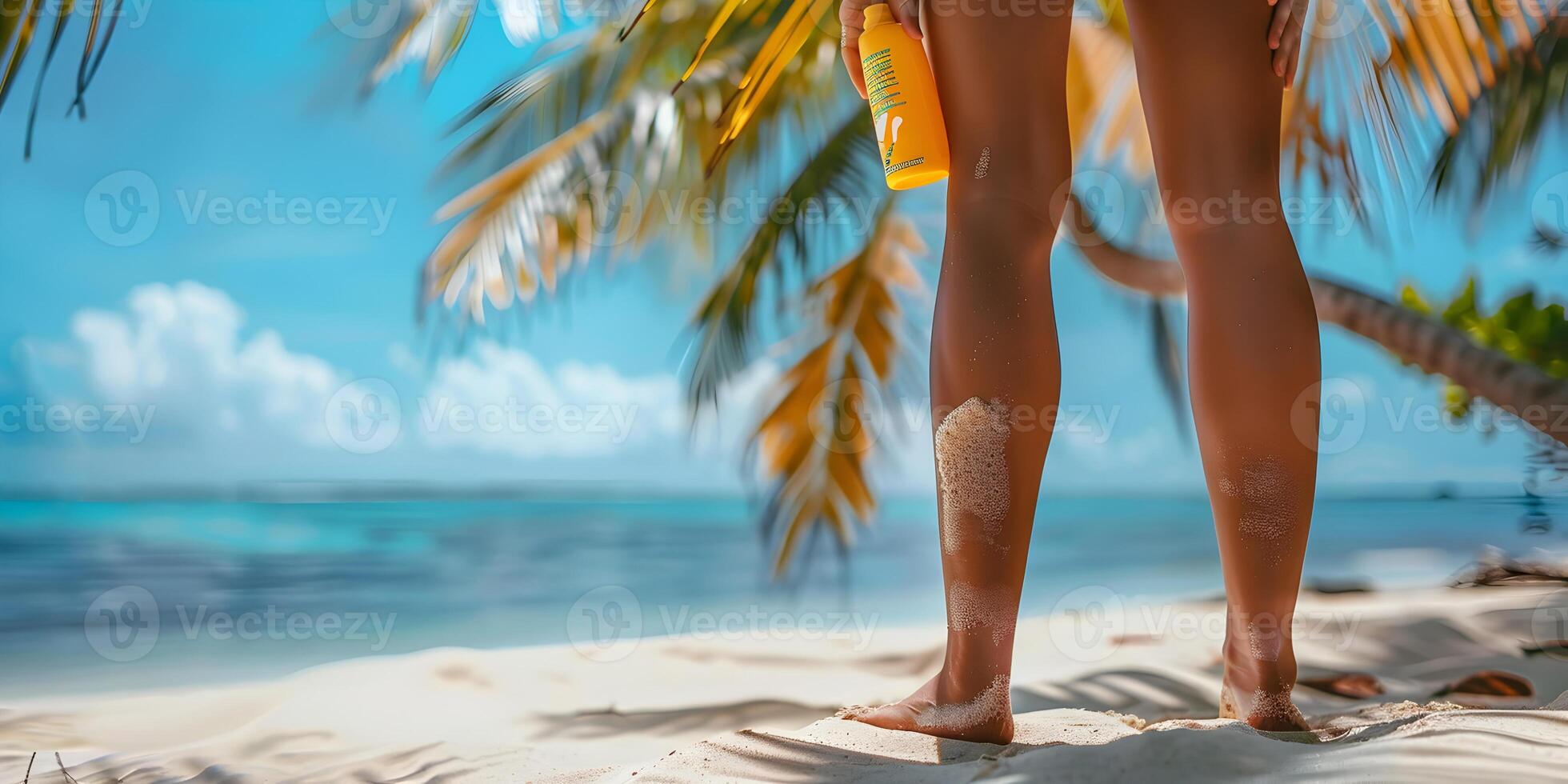 Female legs with sun cream, sunscreen in the hand on tropical white sand and sea background. Sun safety for summer, sun protection factor, skincare, cosmetology and beauty concept with copy space. photo