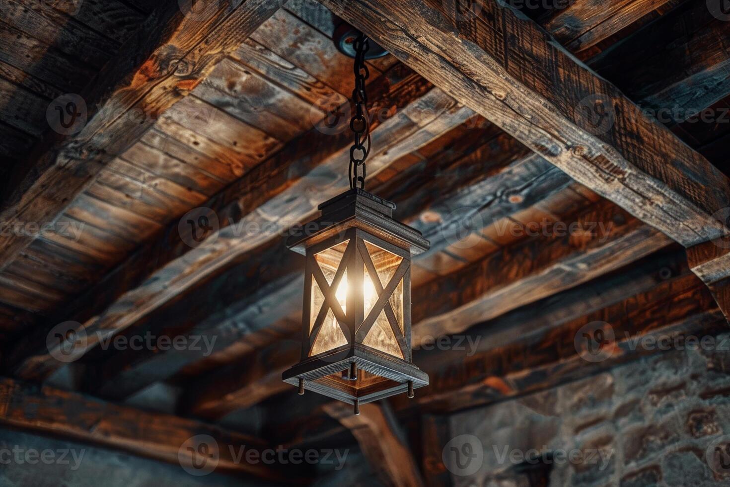Lantern Hanging From Ceiling of Rustic Building photo