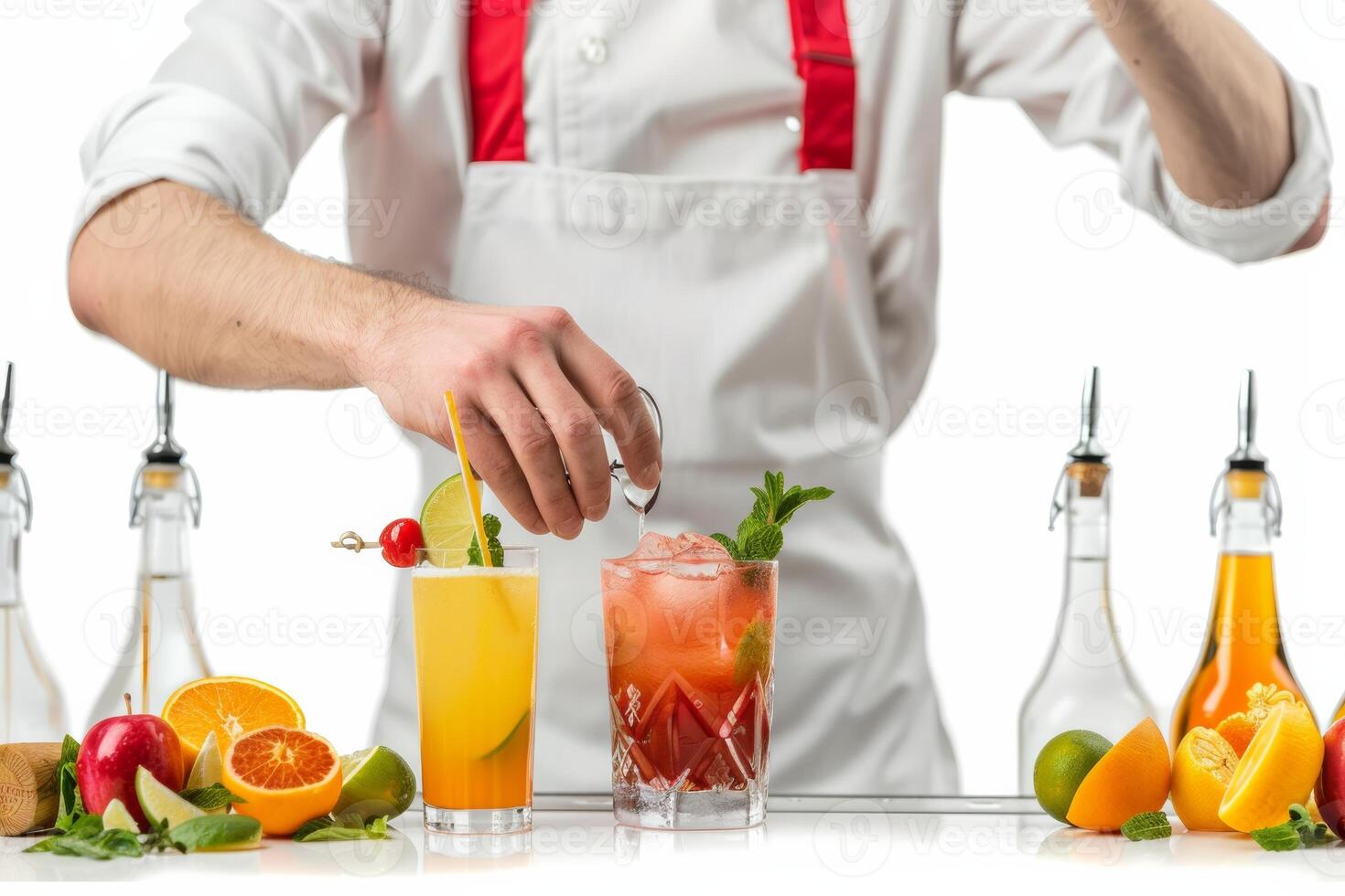 Man in Apron Making a Cocktail photo