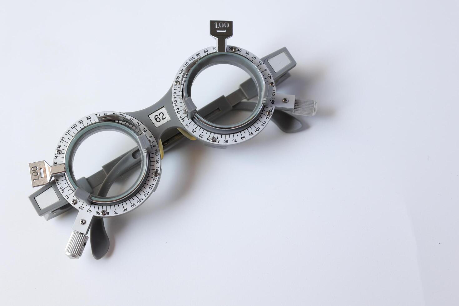 Glasses on chart in optical store photo