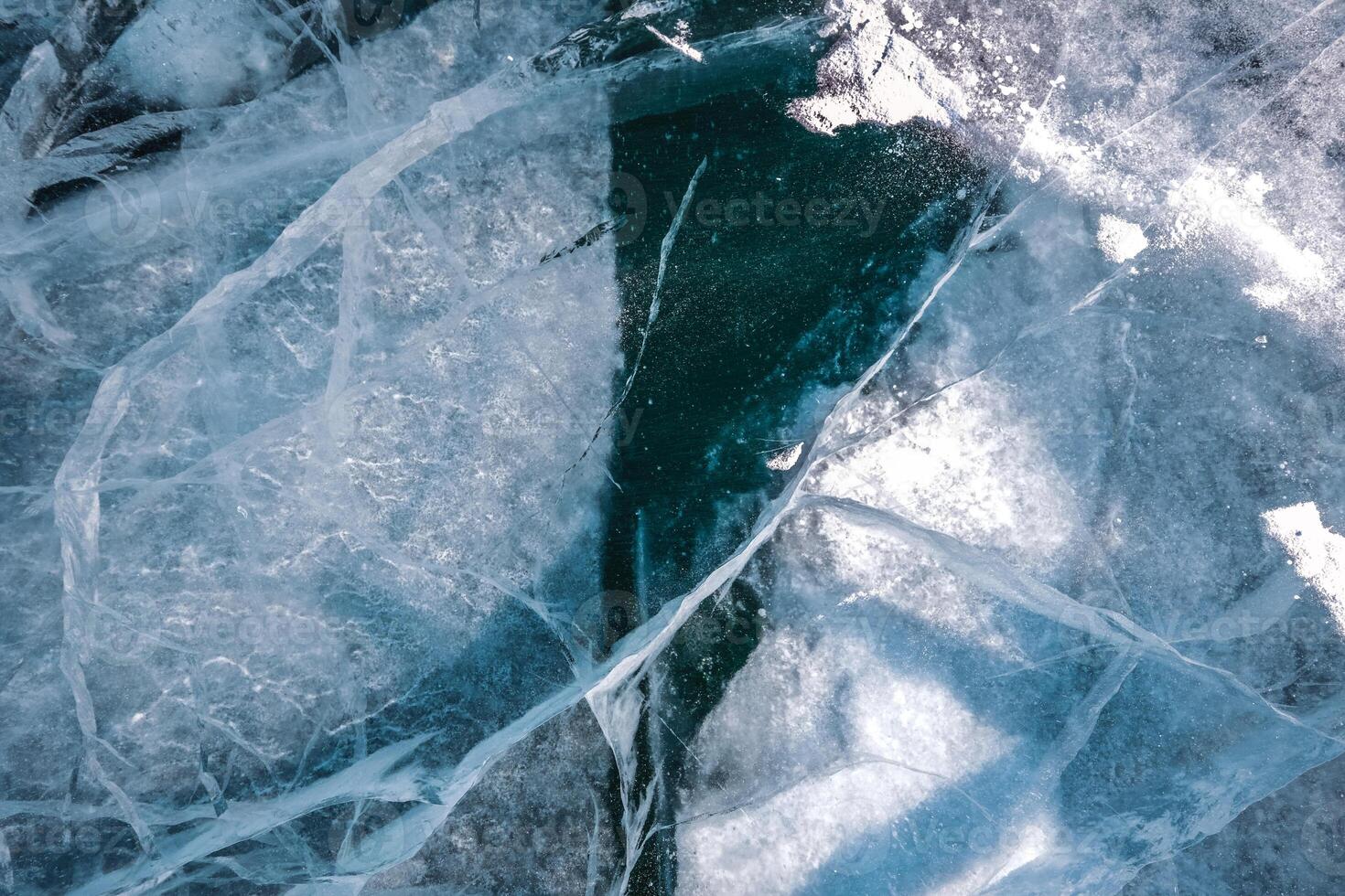 Cracks and bubbles in the ice of Lake Baikal photo