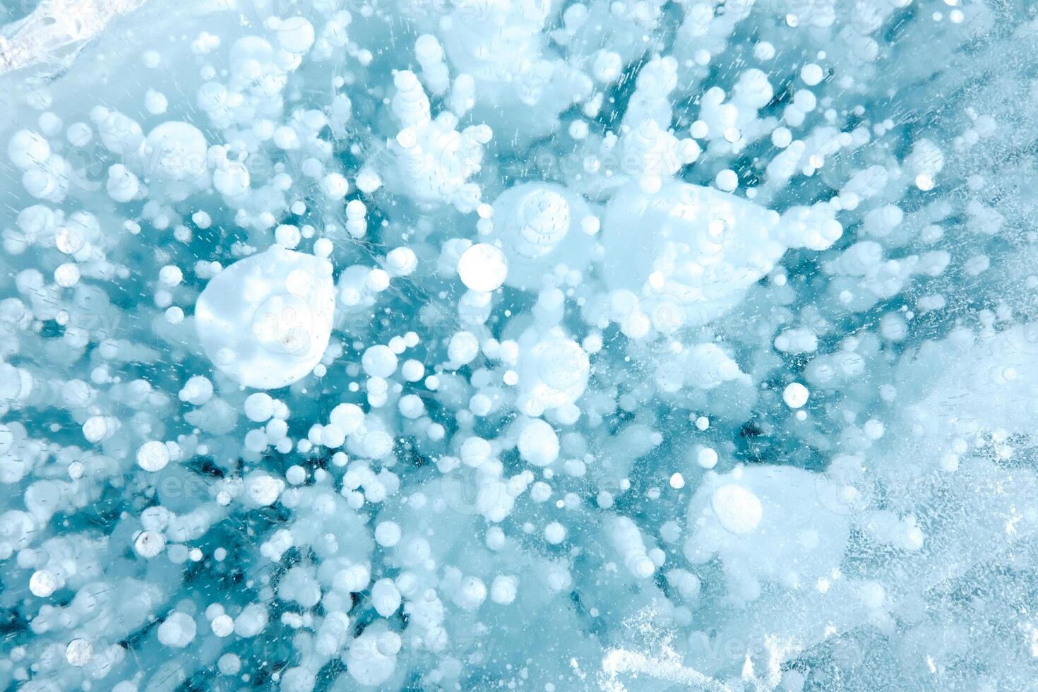Cracks and bubbles in the ice of Lake Baikal photo