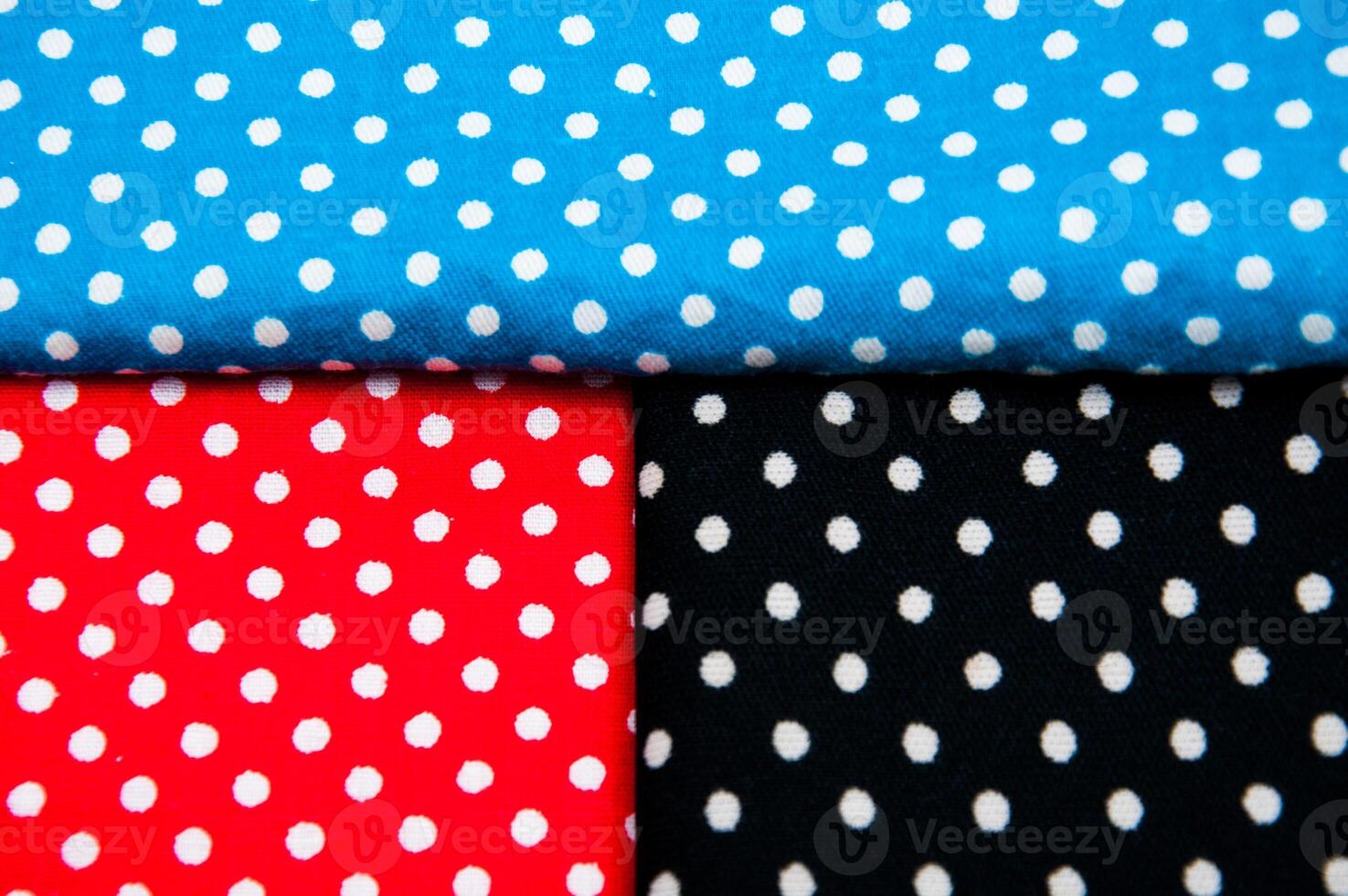 Black , red and blue tissue with polka dots photo