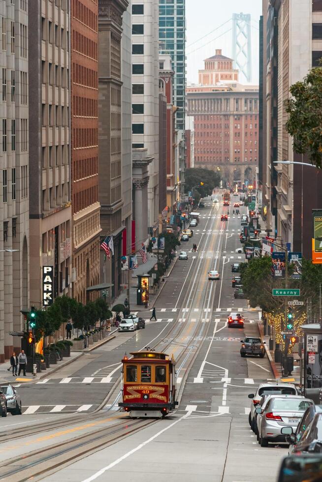 San Francisco, US - 27 Dec, 2023 - Passengers enjoy thir ride in a tram photo