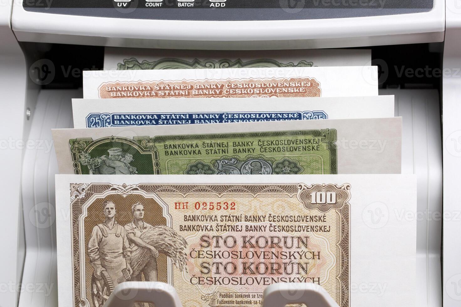 Czechoslovak koruna in a counting machine photo
