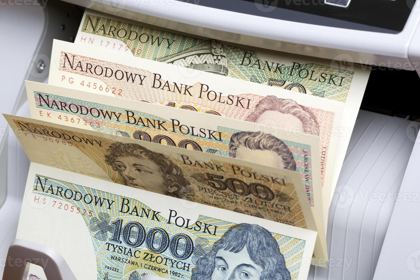Old Polish money in a counting machine photo