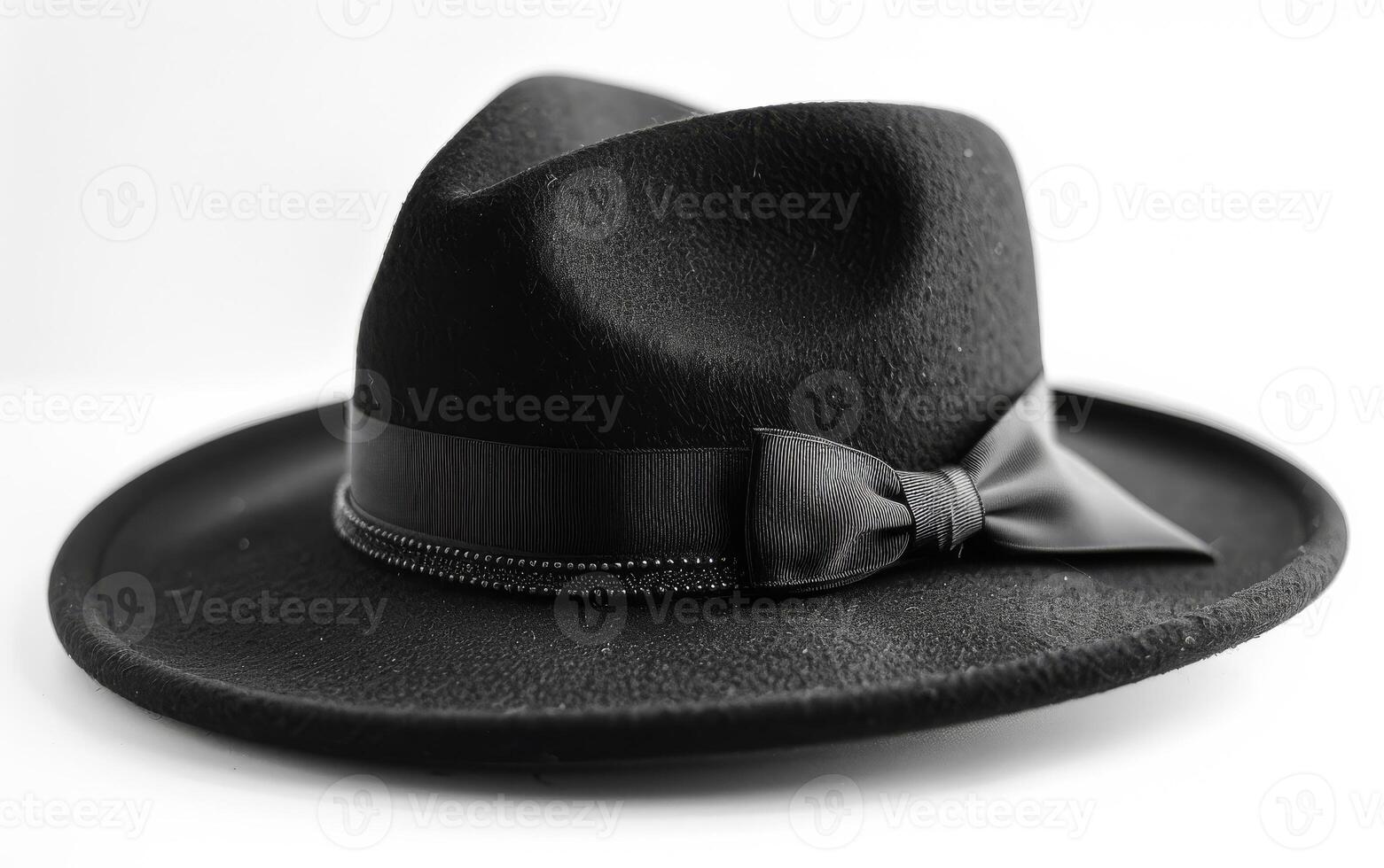 Black hat with bow on white background photo
