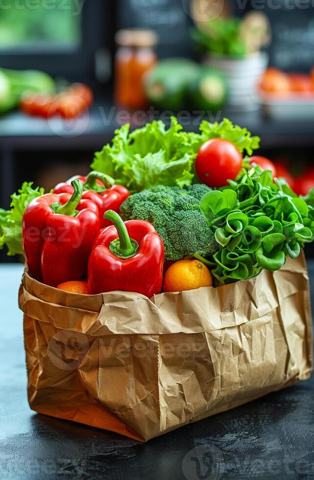 Fresh vegetables in paper bag on wooden table. Healthy food in a paper bag photo