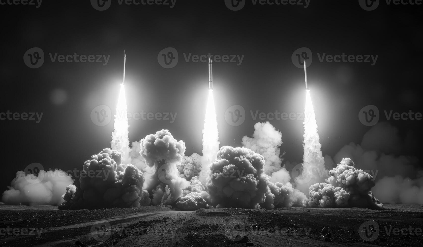Three rockets launching into the night sky. Missile salvo fire lights up the night photo