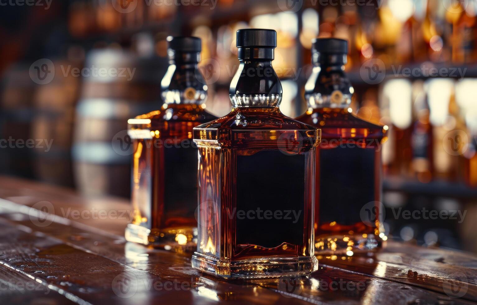 Three bottles of whiskey on wooden table in bar photo