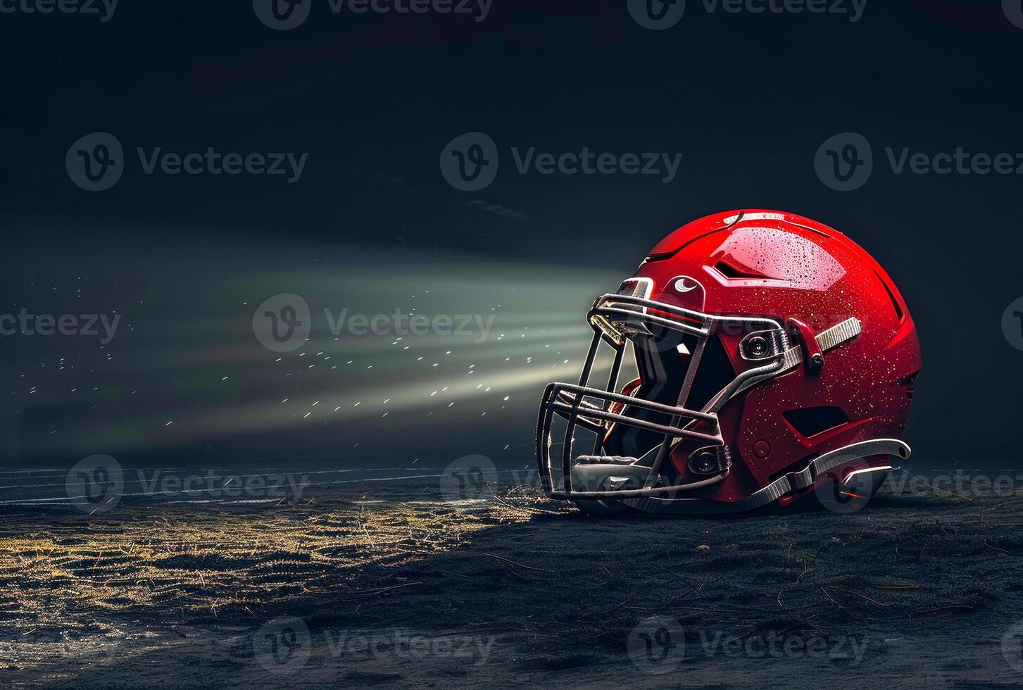 American football helmet standing on the field with the sun shining behind it photo