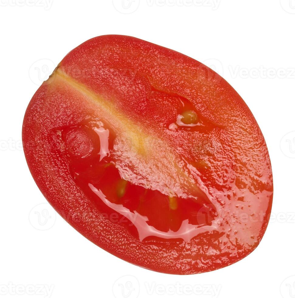 Half of a ripe cherry tomato on an isolated background, top view photo