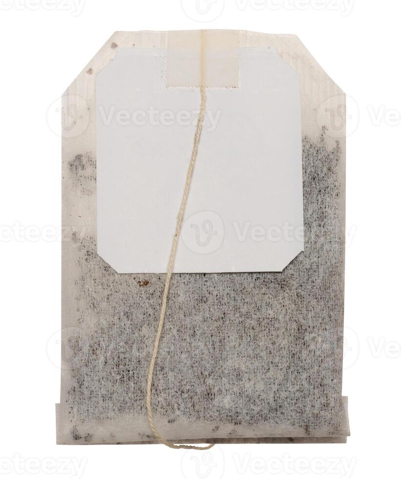 Disposable tea bag with paper label on a string photo