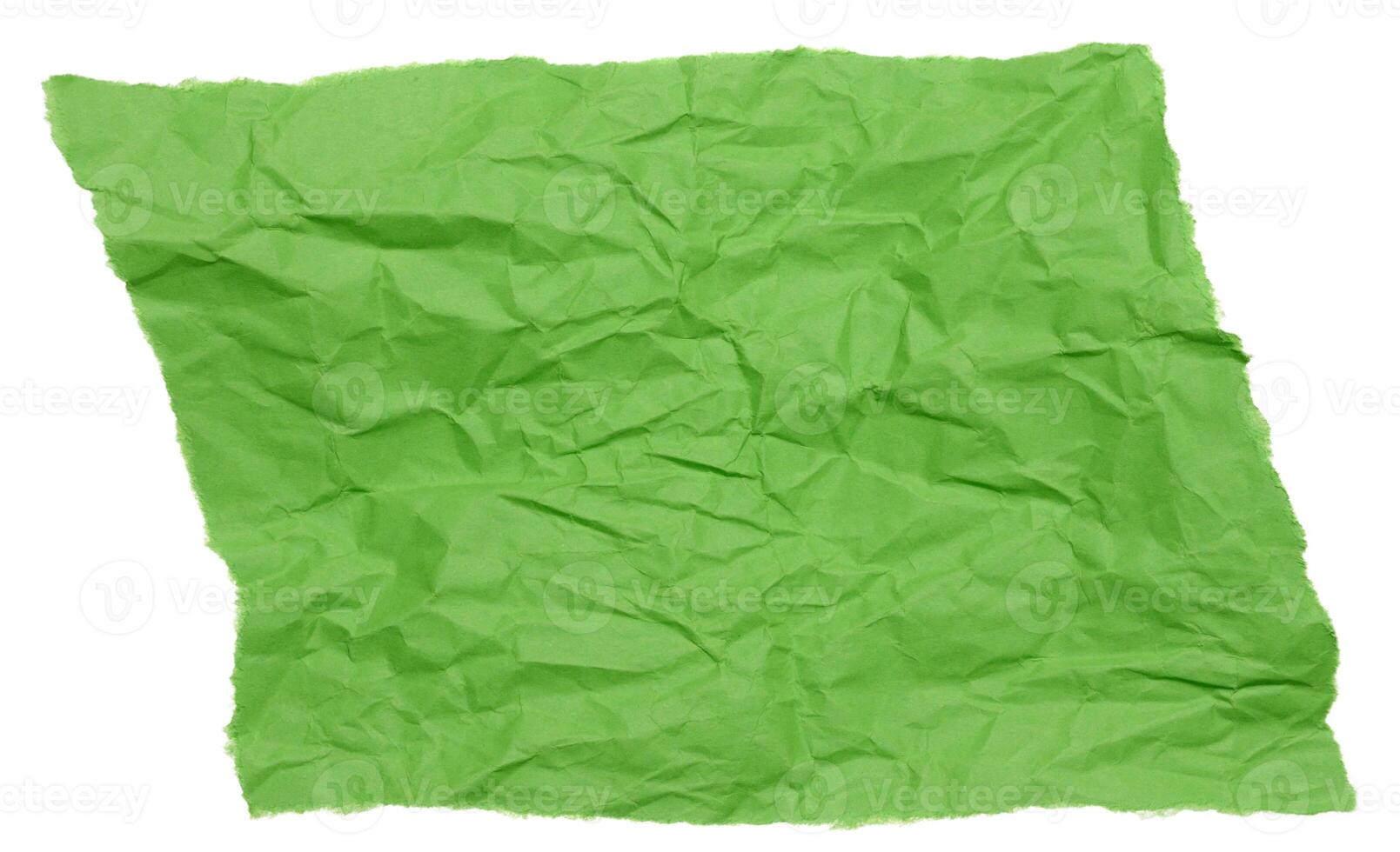 Torn piece of green crumpled paper on isolated background photo