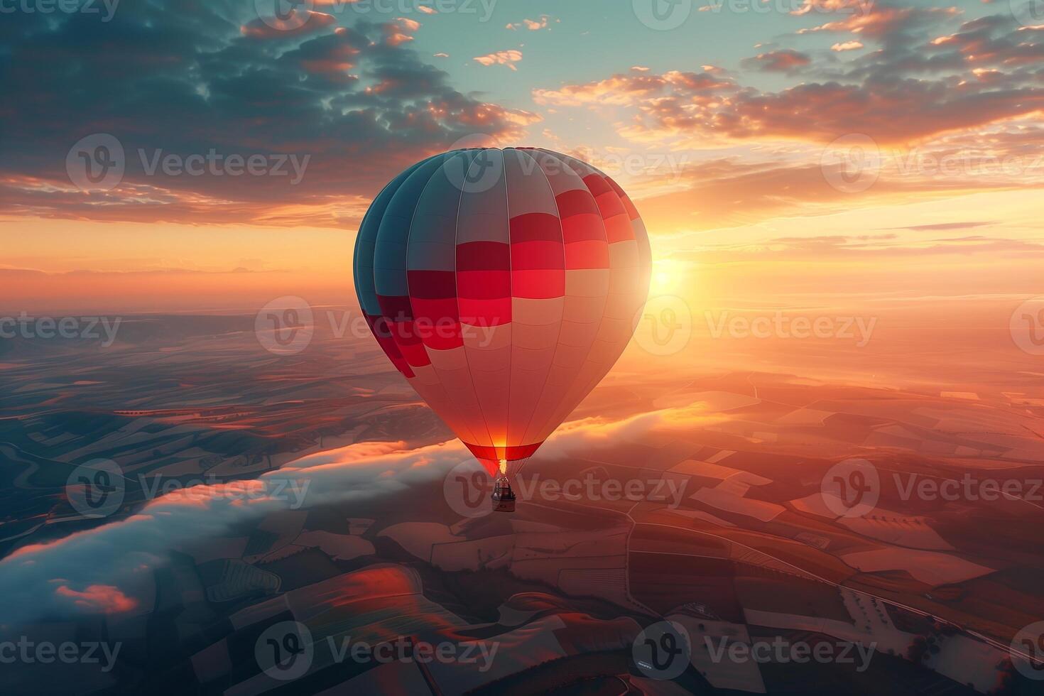 An enchanting hot air balloon ride at sunrise, with the golden glow over patchwork fields below photo