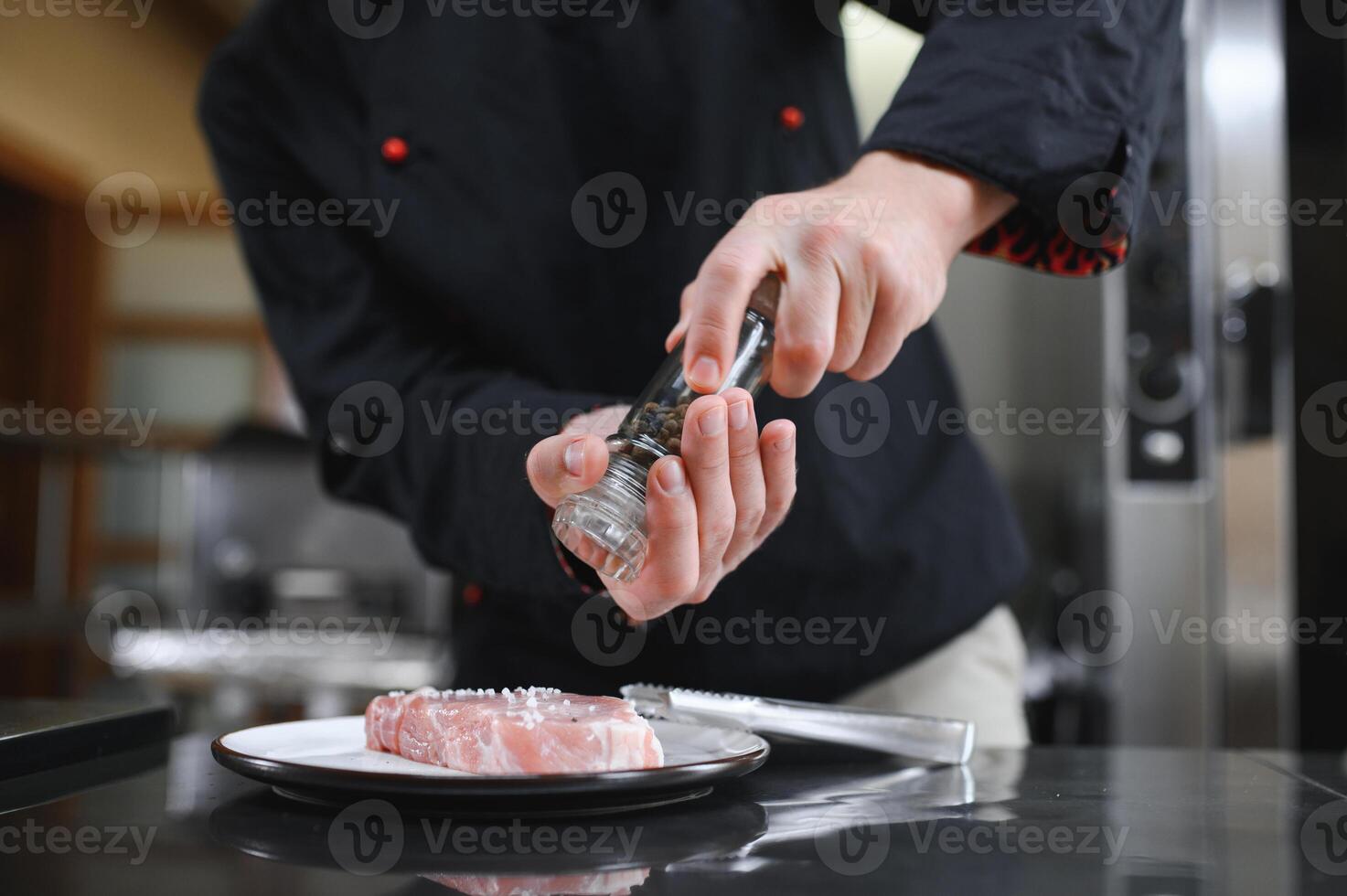 Chef cooks pork steak. Recipe book, cooking, restaurant business photo
