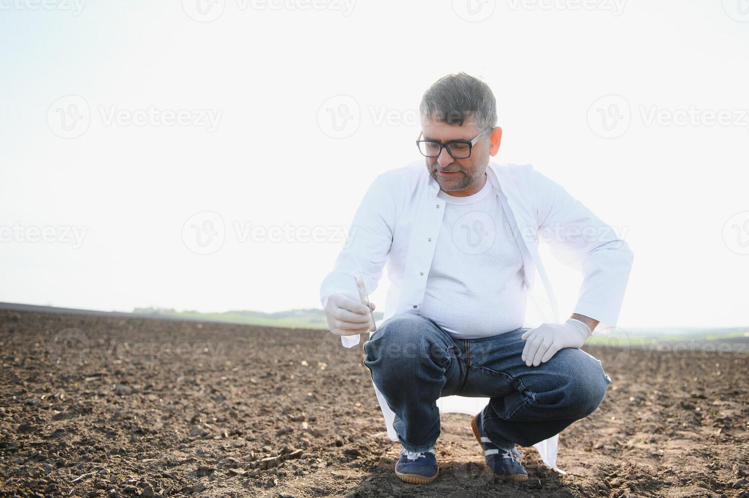 POV view of farmer owner control soil quality before seed plant. Future agriculture concept. photo