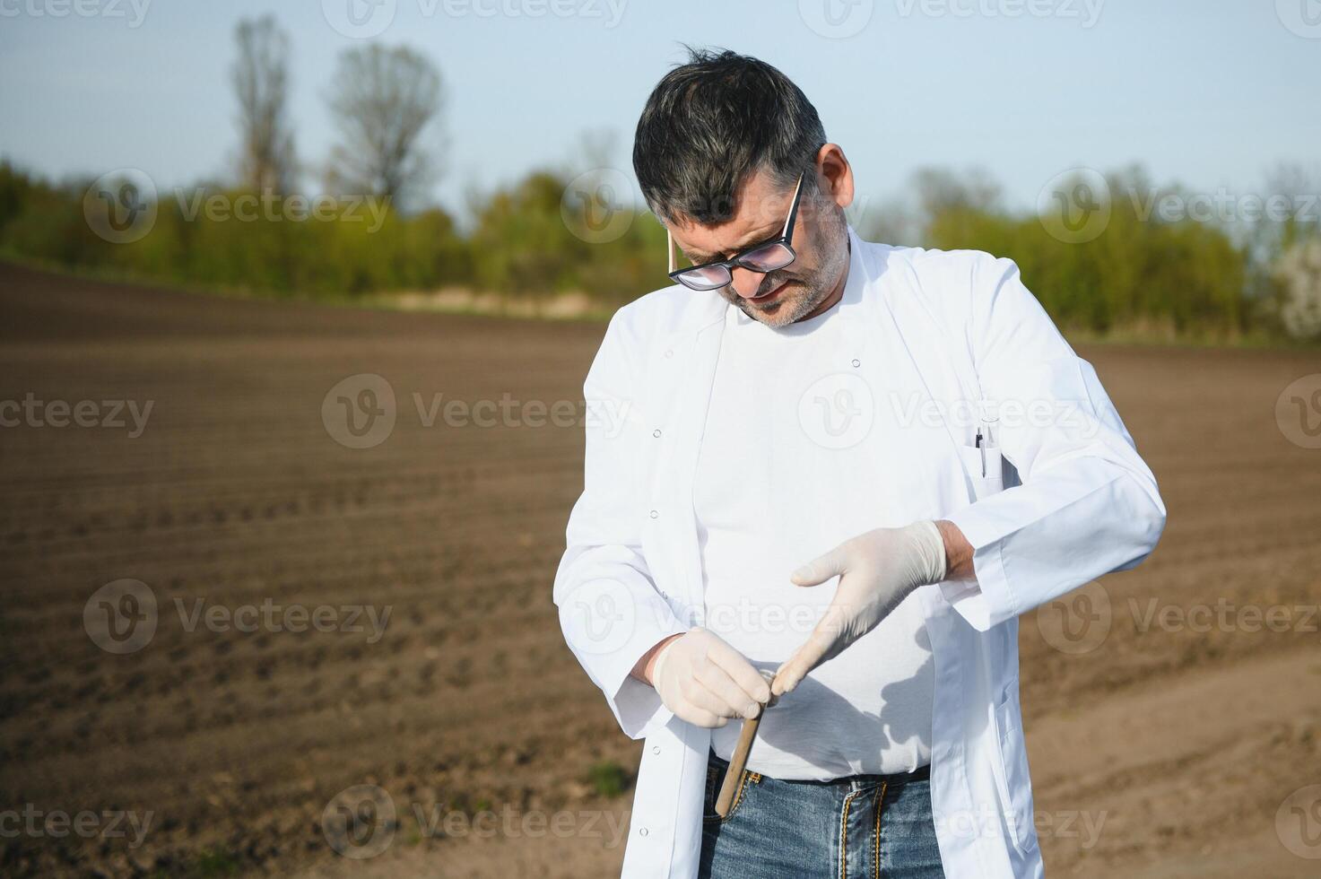POV view of farmer owner control soil quality before seed plant. Future agriculture concept. photo