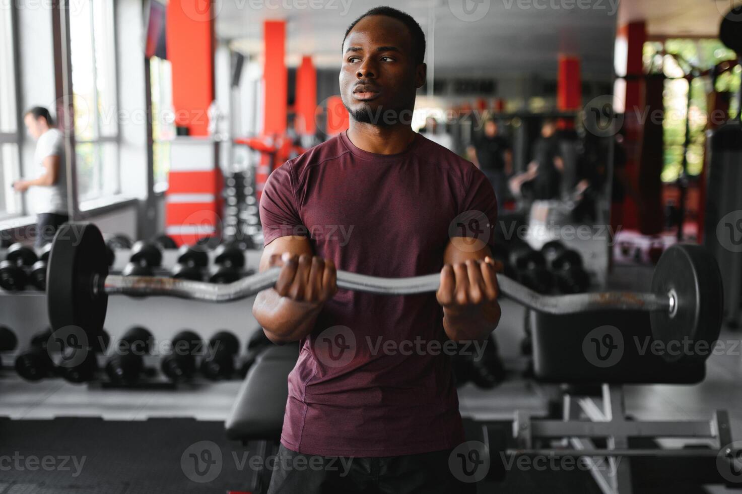 African American young man doing workout at the gym photo