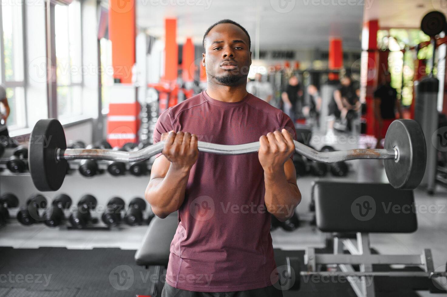 African American young man doing workout at the gym photo