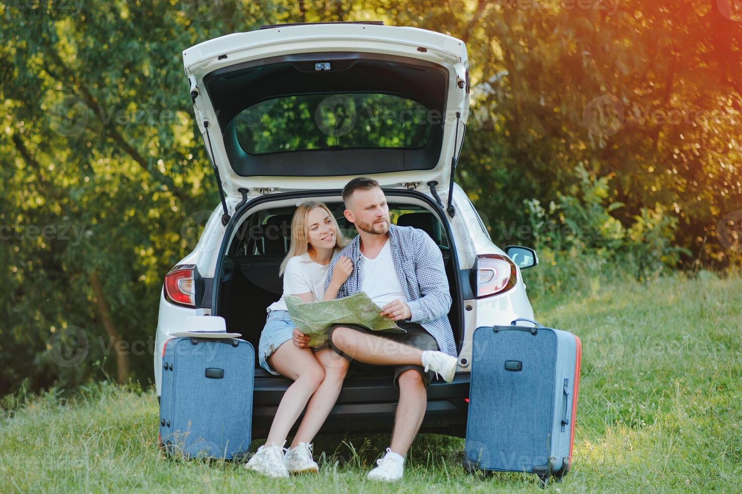 Portrait of happy family. Vacation, Travel - family ready for the travel for summer vacation. suitcases and car route. photo