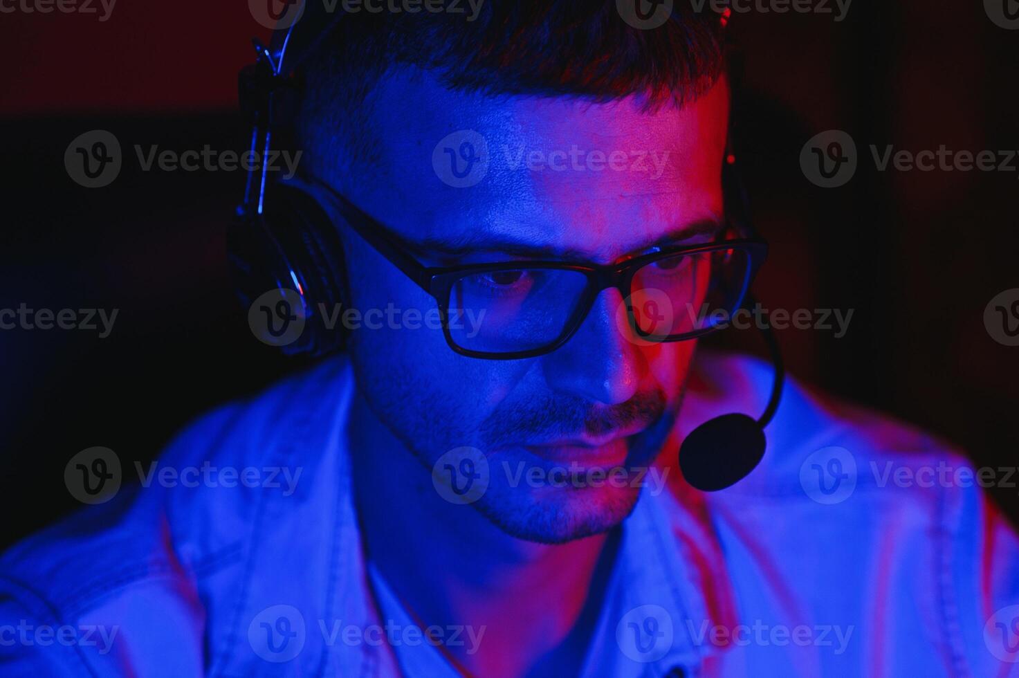 Handsome young male software developer programming codes while working from home photo