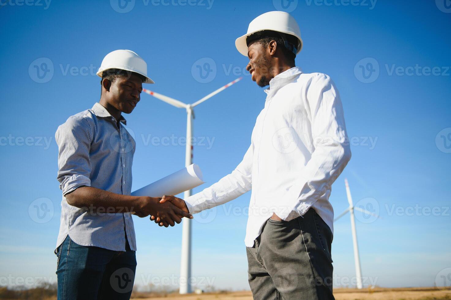 Engineers windmills for production of electric power. photo