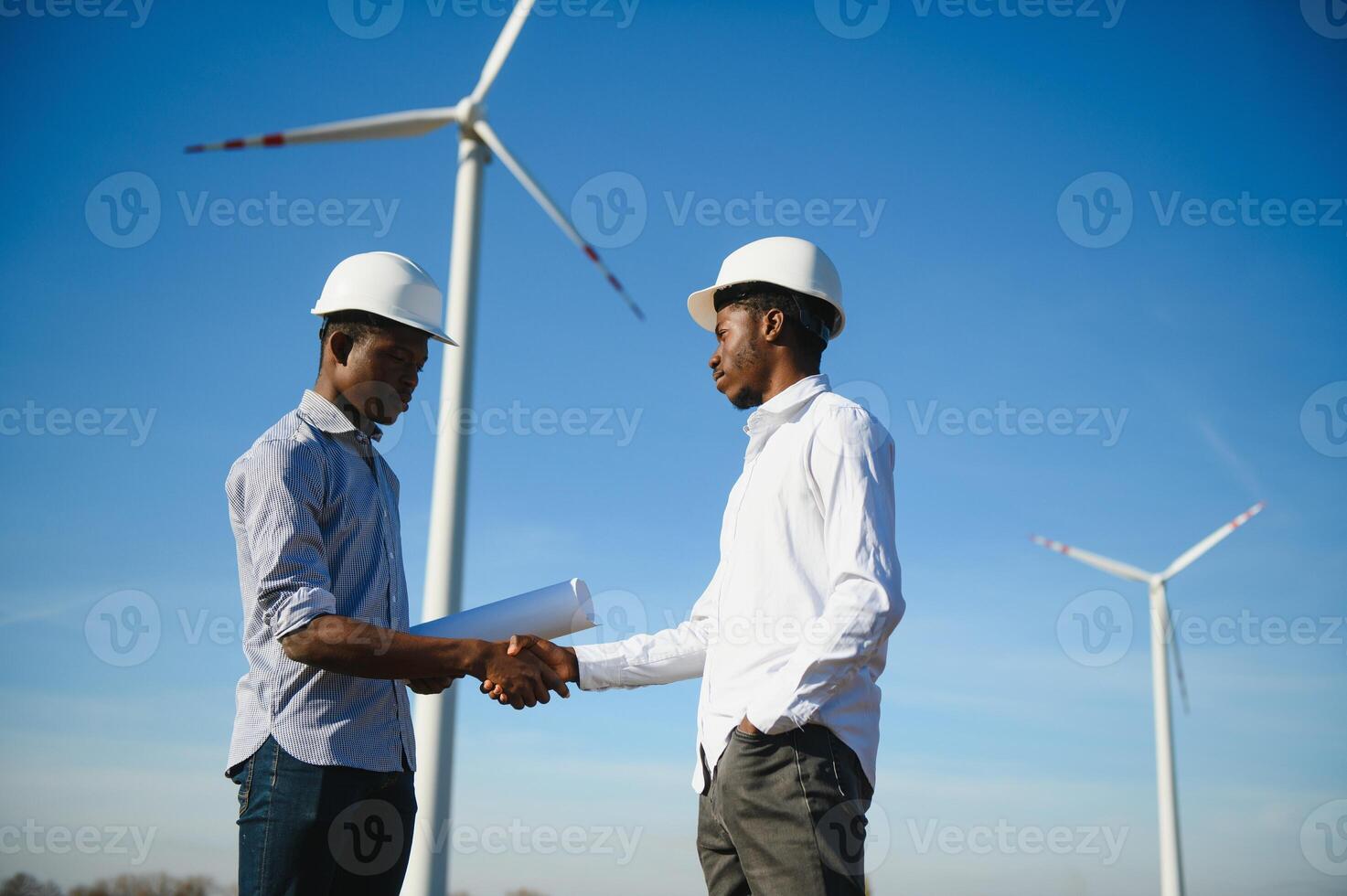 Engineers windmills for production of electric power. photo