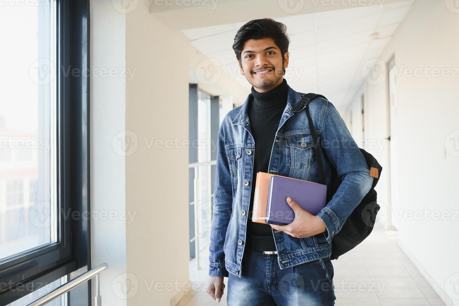 Handsome and young indian Male college student. photo
