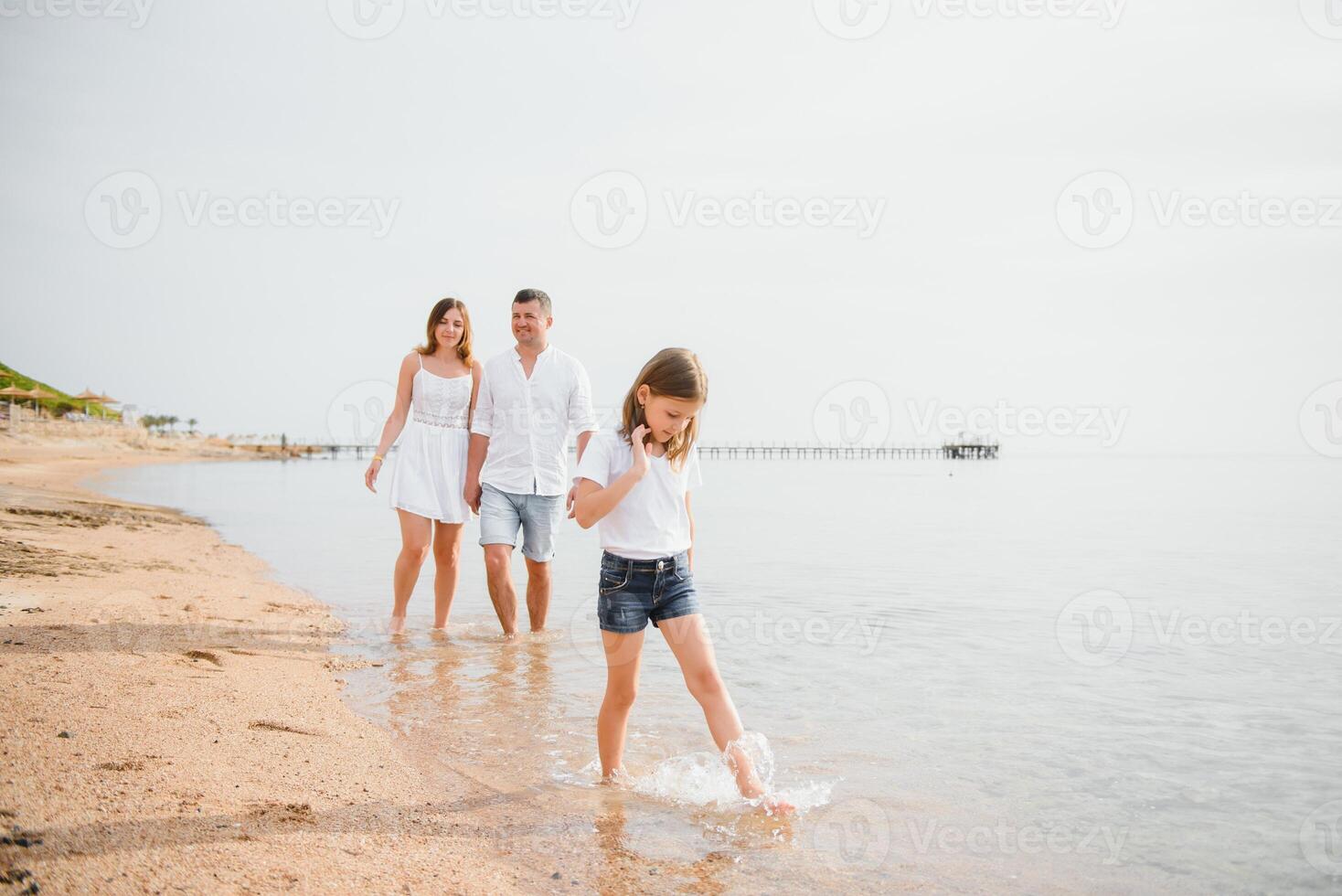 Cute happy family having fun on luxury tropical resort, summer holidays, love concept photo