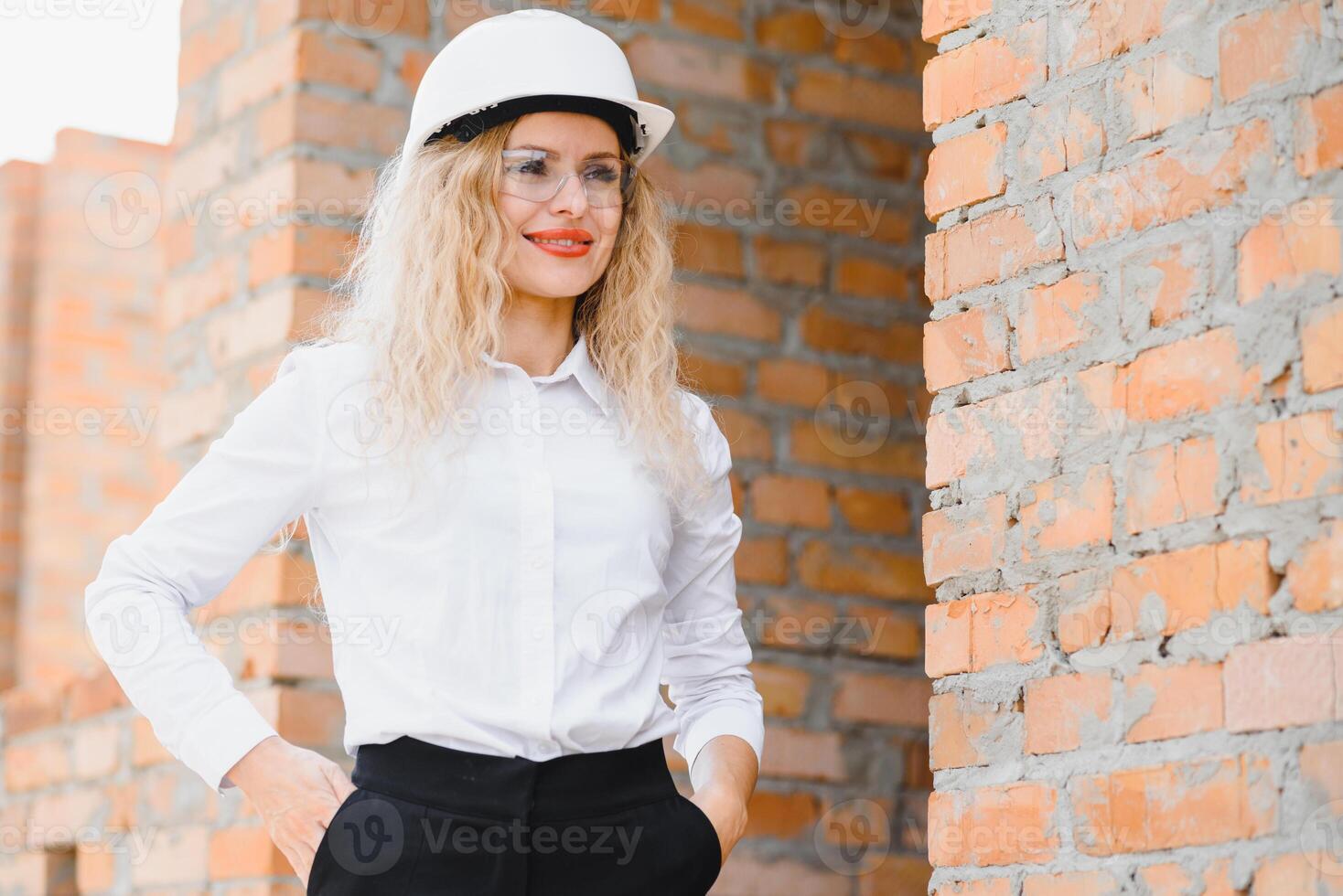 A portrait of engineer woman looking construction. Concept Engineer and business work photo