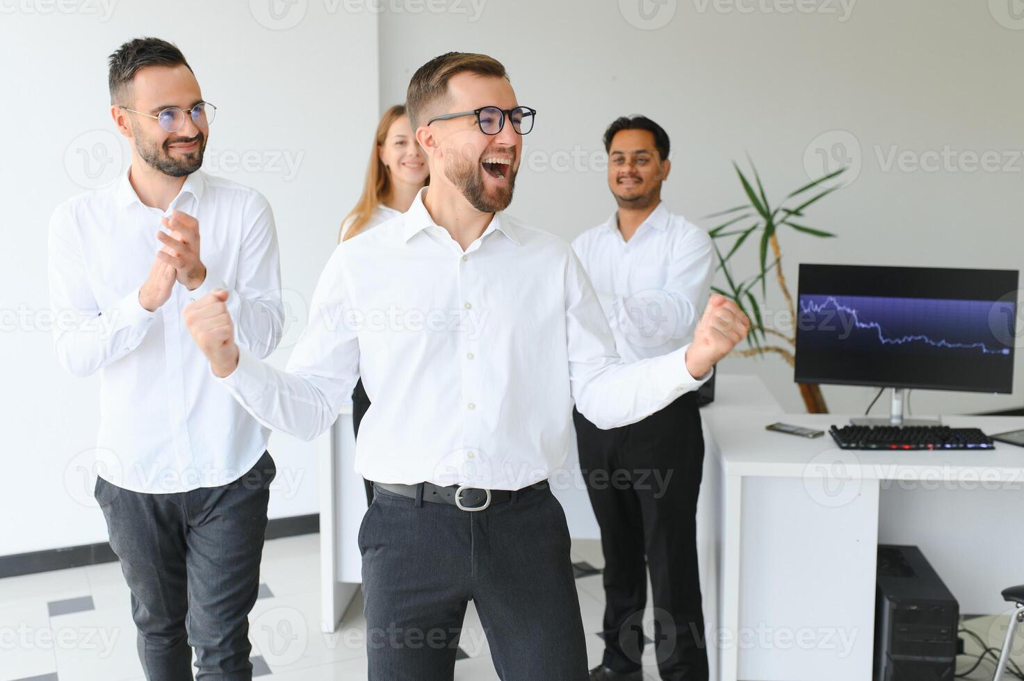 Business people stand on the background of the office corridor photo