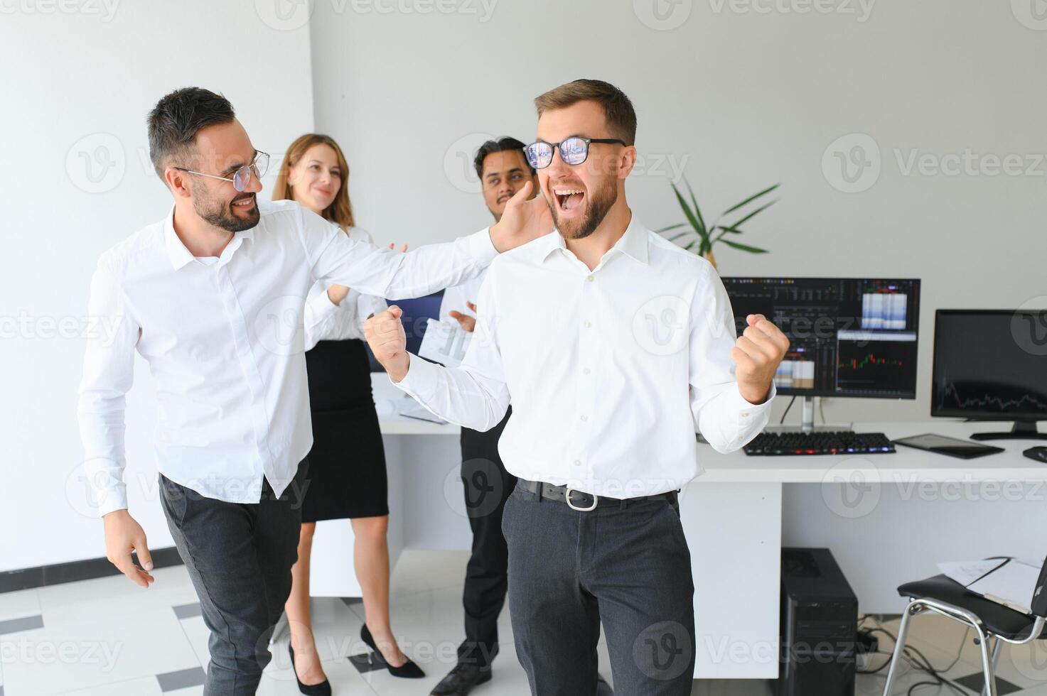 Business people stand on the background of the office corridor photo