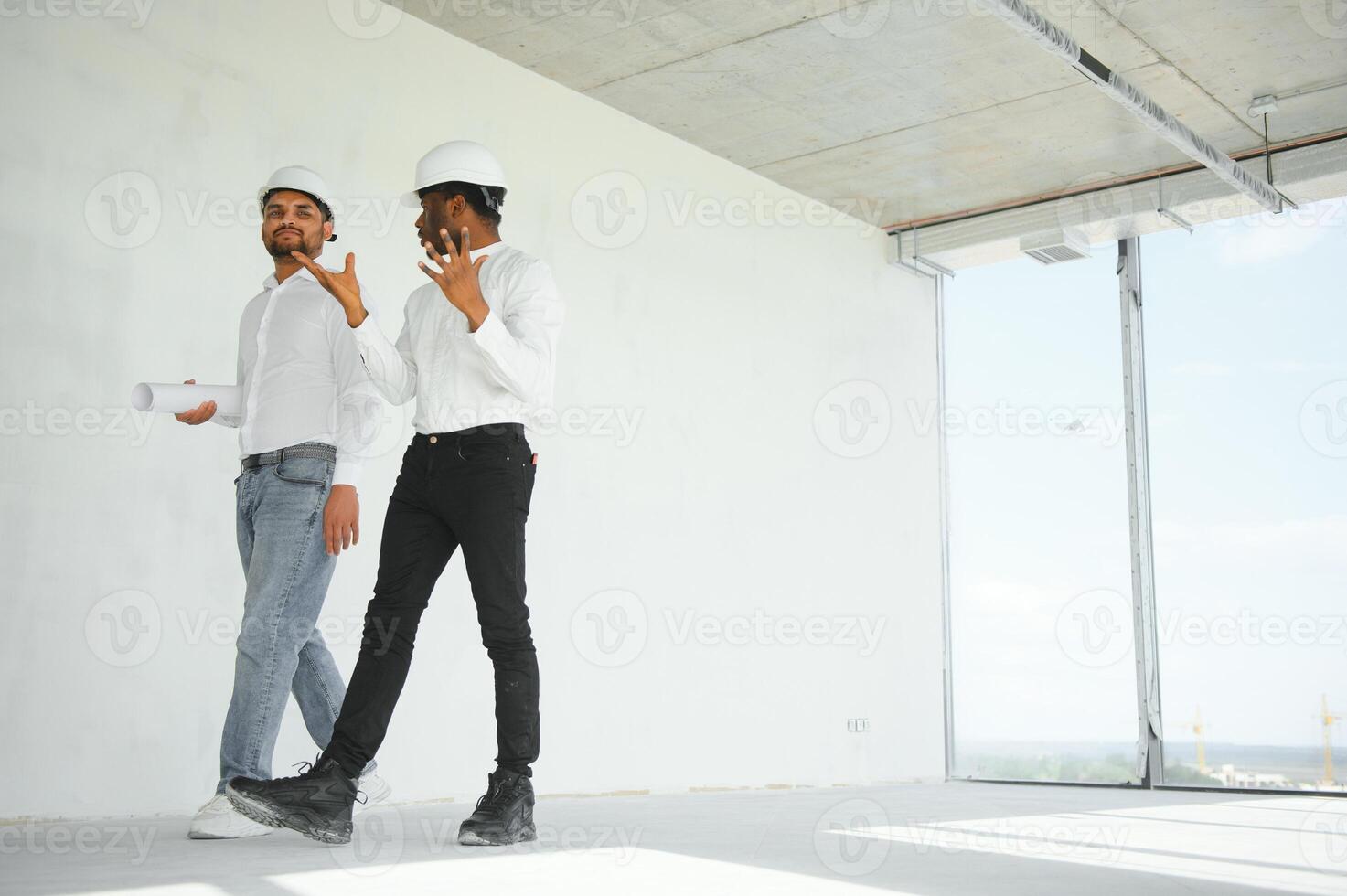 Group of multi ethnic engineer construction site worker meeting at workplace photo